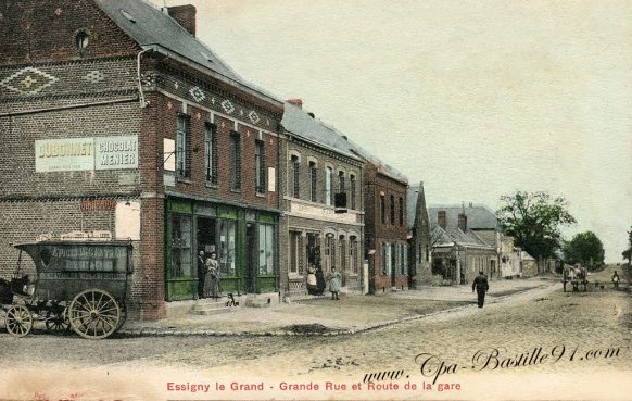 Carte Postale Ancienne d'Essigny-le-Grand - Grande rue et Route de la Gare